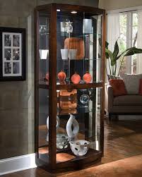 Halogen lights play off the mirrored back and sparkling platinum finish. Pulaski Furniture Curios Pacific Heights Curio Cabinet Wayside Furniture Curio Cabinets