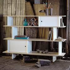 The oeuf mini library nurtures new found independence and encourages a child's interaction with a trusted piece of furniture to see them into the future. Modern Storage Shelves Mini Library Oeuf Canada