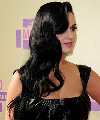 If you want to add more style and charm and get a sophisticated look for your black hair, you are in the right place. Katy Perry Long Wavy Black Hairstyle
