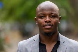 Bald black man Images