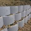 A retaining wall must provide a way to. 1