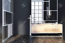 They look elegant with their shiny surfaces and are easy to clean. Ultra Modern Bathroom Interior With Dark Walls A Glass Wall Next To A Wooden Vanity Unit With A Large Mirror Hanging Above It 3d Rendering Mock Up Stock Photo Picture And Royalty