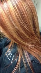 Want to bring a little brightness to your hair but not ready to go fully blonde? Copper Red Hair Color With Golden Blonde Highlights Blonde Hair With Highlights Blonde Hair Color Red Hair With Blonde Highlights