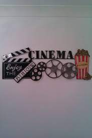 Pleasant wall décor of course. Wall Art Design Ideas Home Inspirations Cinema Wall Art Modern Contemporary Black Simple Wheels Wire Movie Room Decor Home Theater Decor At Home Movie Theater