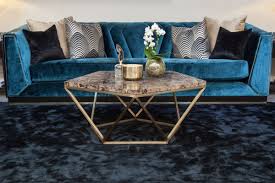 This custom made coffee table is designed to be simple and functional. The Refined And Sophisticated Side Of The Brass Coffee Table