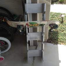 Pin By Dean Klotz On Cool Diy Skateboard Rack Skateboard Rack Ideas Board Rack