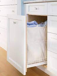 Help keep your bathroom tidy with this lovely mirrored bathroom linen closet with hamper. Ultimate Storage Packed Baths Laundry In Bathroom Laundry Hamper Hidden Laundry