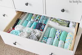 Add plastic totes or even a small dresser to the bottom of the closet for drawer storage. Nursery Dresser Organization