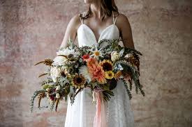Designed as a loose, boho, garden 15 Sunflower Wedding Bouquets