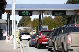 And canadian flags fly atop the peace arch at peace arch historical state park on the border with canada. U S Canada Border To Shut Stocks Drop Again As Coronavirus Impact Widens Amnewyork