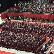 thomas and mack center for a graduation picture of thomas