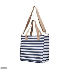 Lightweight tote bags won't weigh you down while hauling bulky items. Kmart Australia Launches 25 Handbag With A Secret Built In Dispenser That Can Pour Wine On The Go Daily Mail Online