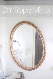 The nautical rope wall mirror combines classic nautical style with a clean modern aesthetic that adds texture and life to any wall. Diy Rope Mirror Tutorial Nautical Style Bathroom Mirror Southern Revivals