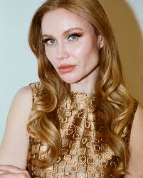 Michael Fausto SS 2025 CASTELLAMMARE The Indorata Top, crafted in a gilded  copper jacquard with lustrous metallic threadwork. Worn with our  high-waisted cappuccino linen bootcut pant.