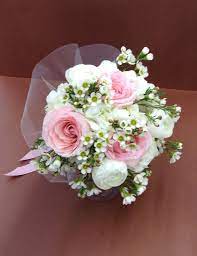 Pink And White Bridesmaid S Bouquet With Garden Roses Ranunculus Wax Flower And Tulle Cuff By Nan Bridesmaid Bouquet White Bridal Bouquet Pink Bridal Bouquet