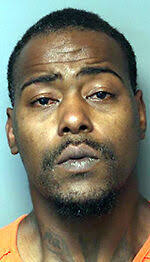 Two face drugs, weapons charges after search