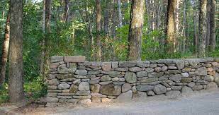 Crushed stone will be needed behind and in your fieldstone wall. New England Fieldstone Wall With Battered Pier And Low Voltage Lighting Traditional Landscape Boston By Sallie Hill Design Landscape Architect Houzz