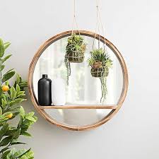 Round Wood Shelf Wall Mirror 27 5 In Kirklands Modern wall mirrors dazzle in the living room, bedroom and entryway. round wood shelf wall mirror 27 5 in