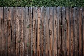 Add a beautiful wooden fence to your yard. 7 Wooden Fence Maintenance Tips