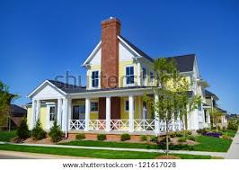 Center chimney cape.with wrap around porch : Shutterstock Puzzlepix