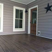 Embrace the front porch lifestyle by giving yours an update. How To Paint A Diy Stained Front Porch Porch Remodel Porch Stain Stained Front Porch