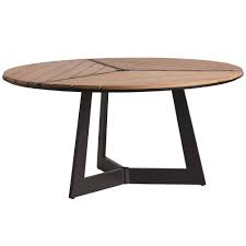 The table assures durability and provides dining space for up to five people. Tommy Bahama South Beach 60 Round Dining Table 3940 875