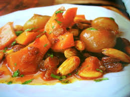 Moroccan couscous spring vegetables golden raisins toasted almonds. Moroccan Butternut Squash Tagine With Almonds Golden Raisins Recipe By Renee Loux