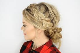Cover the hair donut with your hair from your ponytail. Dutch Braids And Low Messy Bun