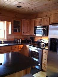 Dark Countertops Pine Cabinets Log Home Kitchens Kitchen Remodel Home Kitchens