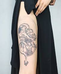 Medivial dragon tattoo on right back. Dragon Tattoo By Jay Rose Tattoogrid Net