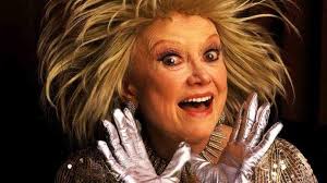 In 1973, Phyllis Diller was a centerfold for Field & Stream. She's talking  to Johnny Carson