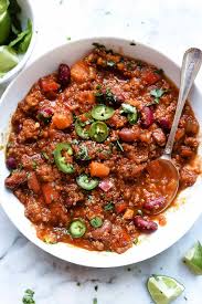 This Healthy Slow Cooker Turkey Chili Combines Sweet Potato Kidney Beans And Quino Slow Cooker Chili Recipe Slow Cooker Turkey Chili Turkey Sweet Potato Chili