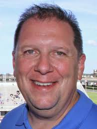 Jesuit brings back Mark Songy as football coach