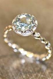 24 Amazing Engagement Rings That Make You Smile More Than You Should Reverie Engagement Rings Affordable Aquamarine Engagement Ring Pretty Engagement Rings