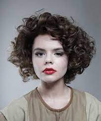 10 Best Short Thick Curly Hairstyles The Hairstyler Short Curly Hairstyles For Women Curly Hair Styles Thick Hair Styles