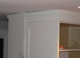 You can easily install crown molding on your kitchen cabinets will give your home a finished and sophisticated look. Kitchen Cabinets And Uneven Wavy Ceiling