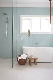Light Blue Subway Tile With Warm Grey Floors Luxury Bathroom Tiles Patterned Bathroom Tiles Trendy Bathroom