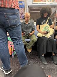 My dad in the green pants is taller than woman to the right of him. :  rconfusing_perspective