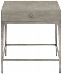 Its fancy face wood top with gallery rails and cast aluminum base with long, tapered legs make a strong statement. Bernhardt Linea Console Table