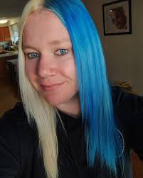 jwilly92191 shows off her chaotic side with a Jinx split dye 😍💙  https://arcticfoxhaircolor.visitlink.me/T7uka8