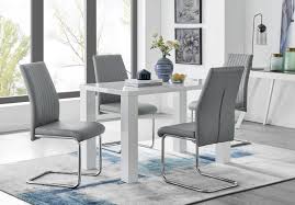 While these furnishings don't have to match, choosing complementary designs will help your interior to feel unified and emphasise your interior design theme. White High Gloss Dining Table 4 Lorenzo Chairs Furniturebox