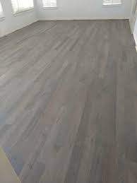 This Beautiful Oak Hardwood Was Stained A Gorgeous Gray By Our Professional Crew Flooring Oak Hardwood Grey Stain