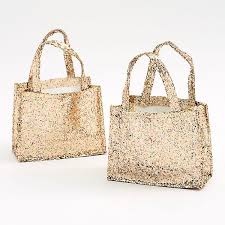 It has to do with surface area and the amount of light reflecting off it. Gold Chunky Glitter Treat Bags Paper Source
