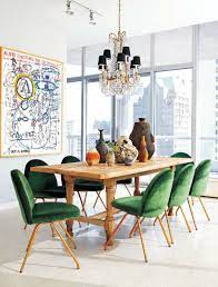 Choose from several colorful upholstery options—including sea foam, charcoal, and yellow—for this set of two chairs. Green Dining Room Table Chairs Image Via Chicagohome Velvet Dining Chairs Dining Room Inspiration Eclectic Dining