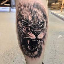 Lion Tattoo On Calf Lion Tattoo Designs Calf Tattoo Calf Muscle Tattoo