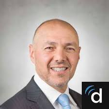 Dr. Ezra E. Cohen, MD