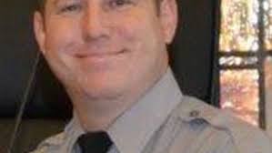 N.C. deputy, 1 of 3 shot in 9-hour standoff, dies from his injuries