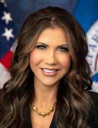Kristi Noem, aka ICE Barbie, just painted the side of the border wall  facing the United States. I guess we're the ones they're worried about  escaping now. What a sh*t show and