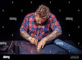 Craftsman performing leatherwork
