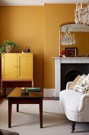 A Color Story Mustard Yellow In Interior Design The Nordroom Yellow Walls Living Room Yellow Living Room Living Room Paint